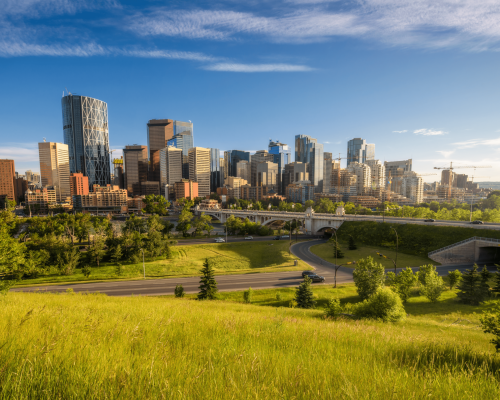 Summer moving day in Calgary with bright blue sky